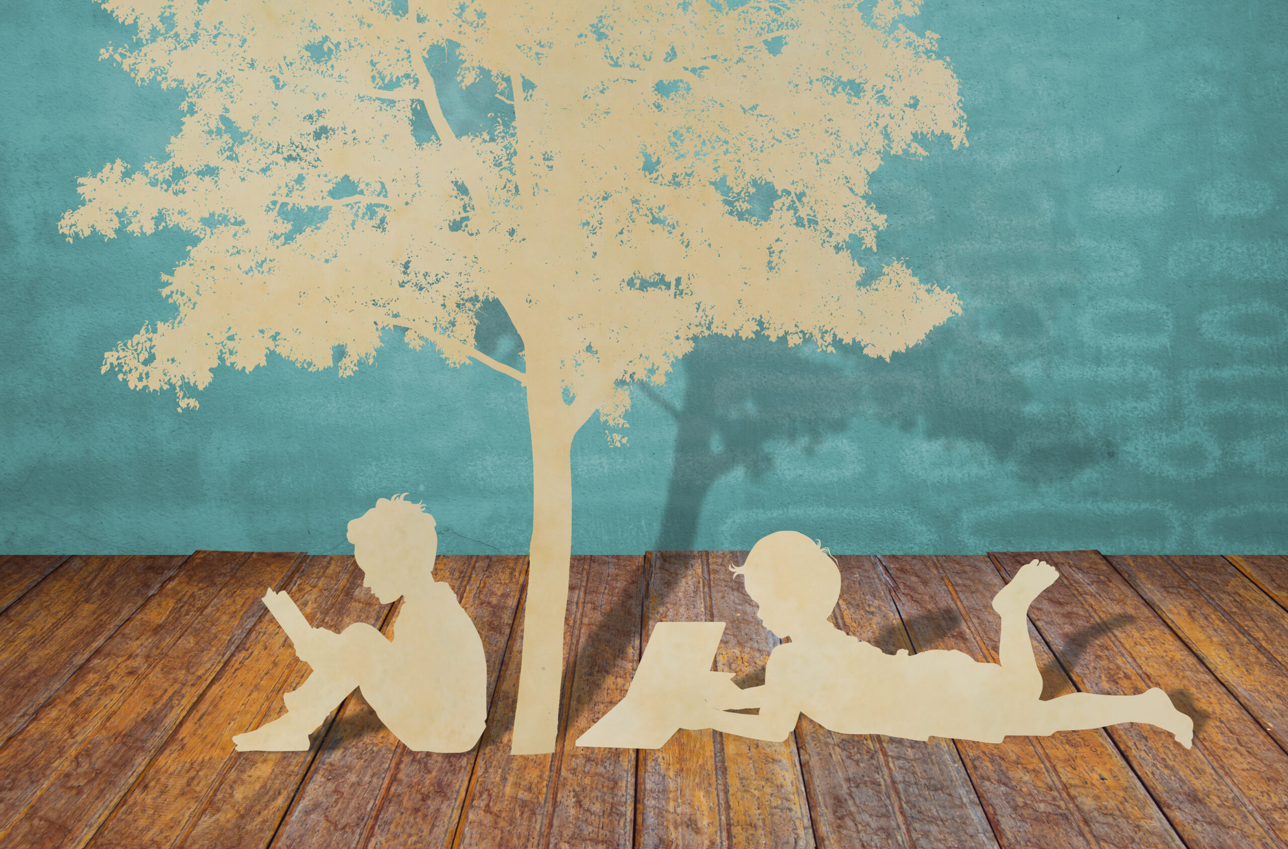 Paper cut of children read a book under tree Paper cut of children read a book under tree